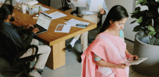 Professionals collaborating around a conference table